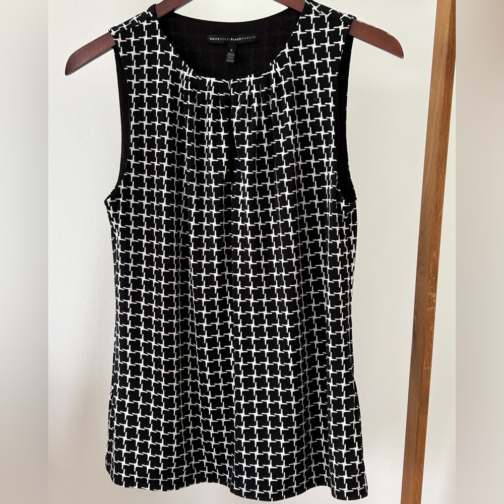 WHBM black print sleeveless blouse. Size small.